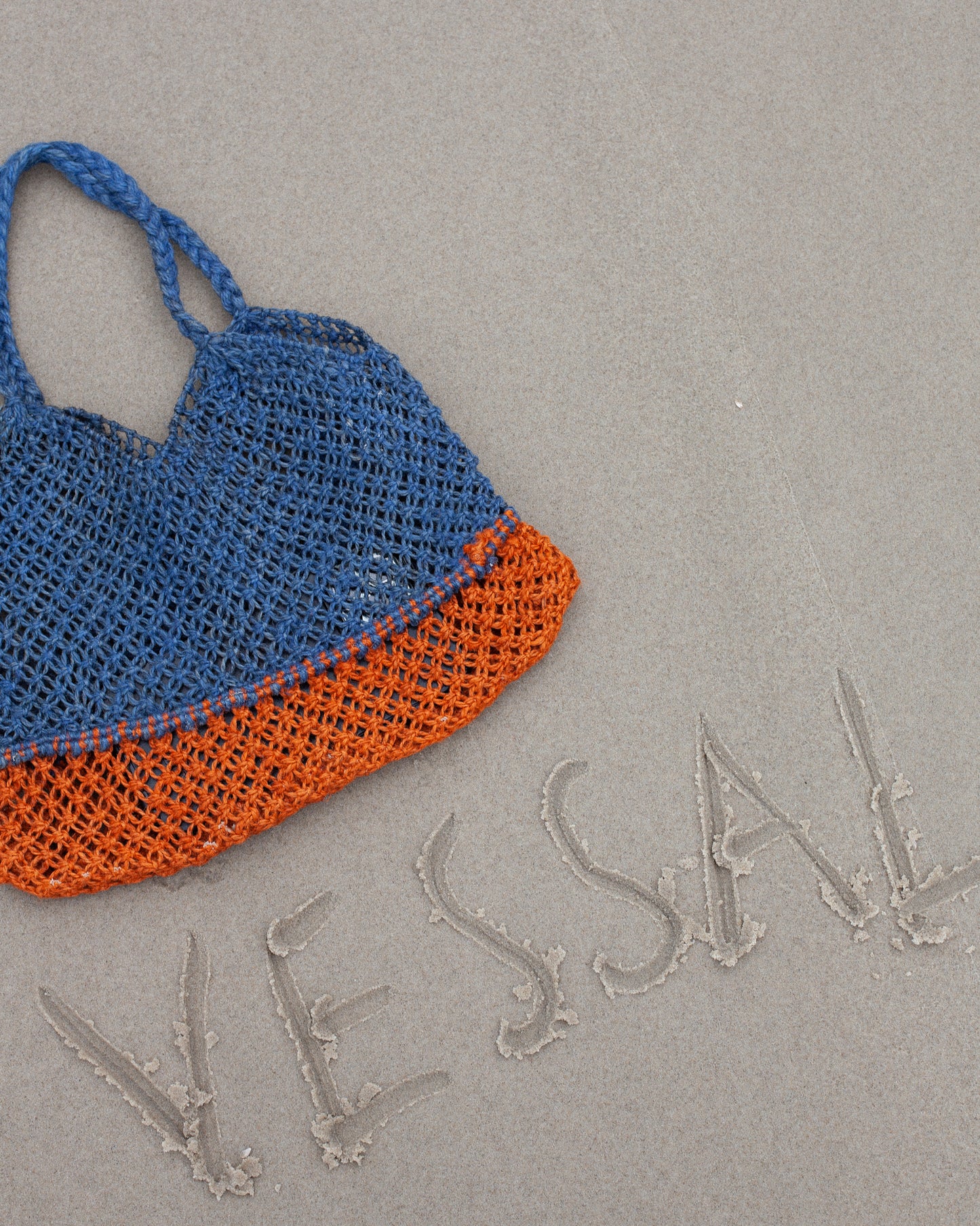 WOVEN HANDBAG - INDIGO AND RUST